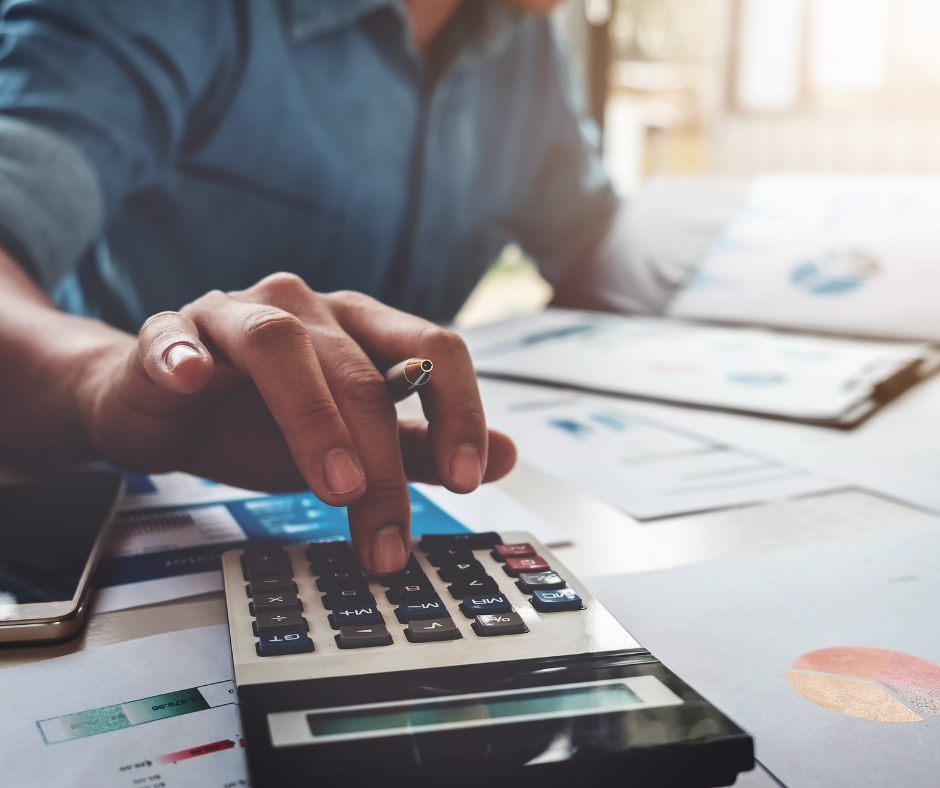 A person using a calculator.