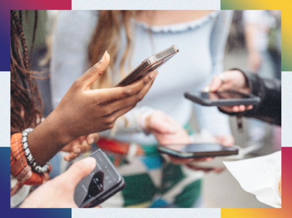 A group of people holding their phones near each other, framed with colourful corners.