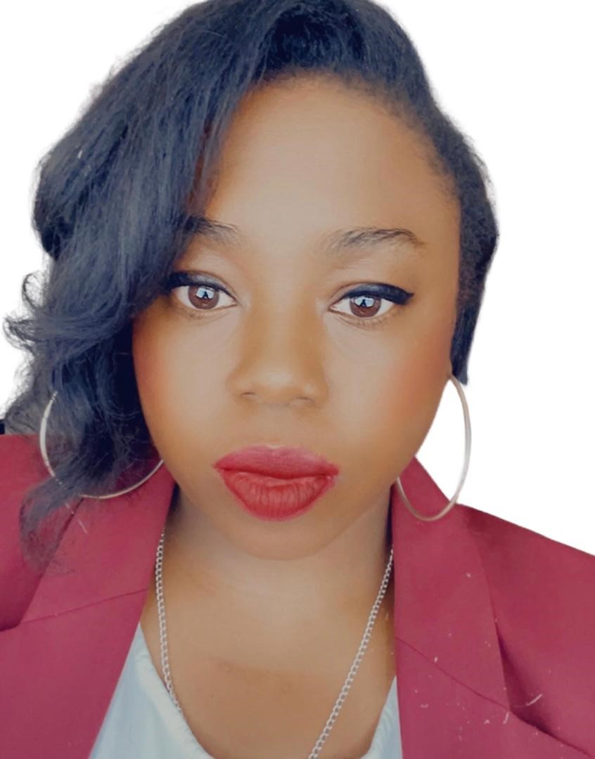 A photo of Narraser wearing a red top.