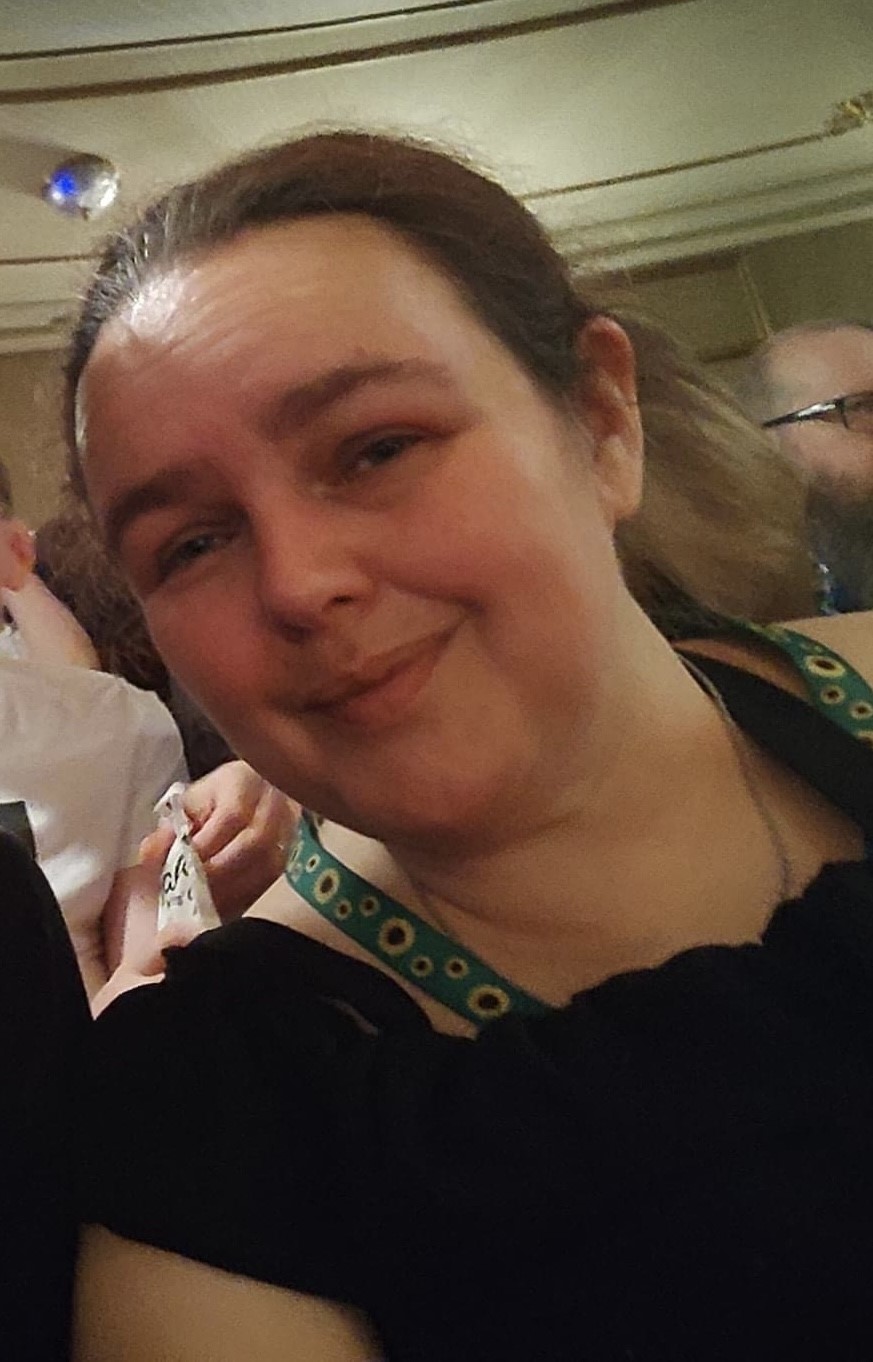 A photo of Clare Charlton smiling.