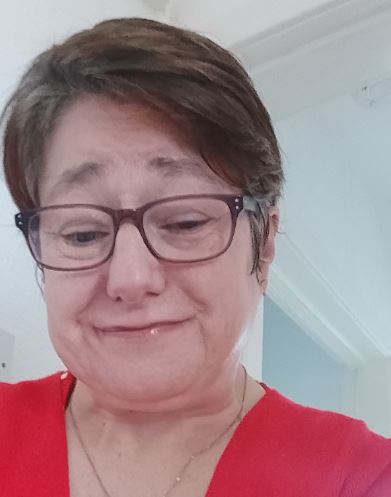 A photo of Kirsty Lowe smiling.