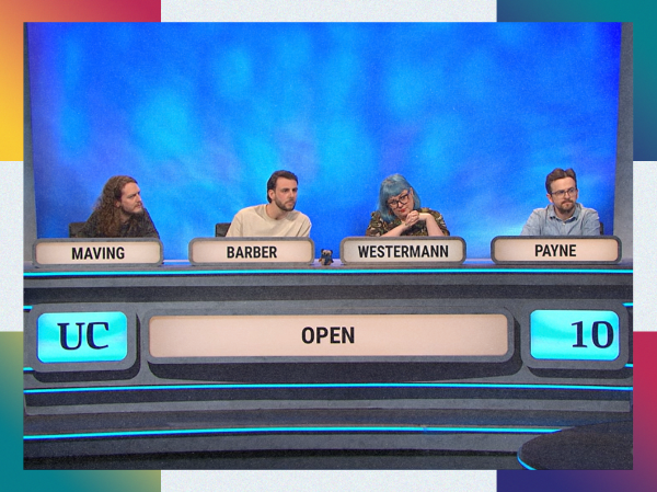 The 2024-2025 Open University team on set of University Challenge behind their desk, waiting to answer a question, framed with colourful corners.