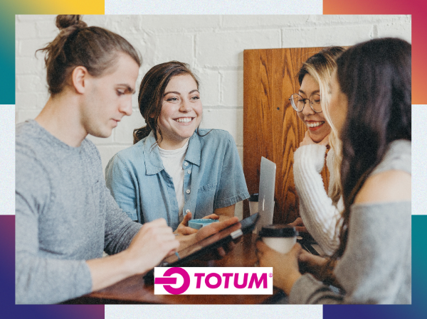 A group of people sat smiling together with the 'TOTUM' logo at the bottom, framed with colourful corners.